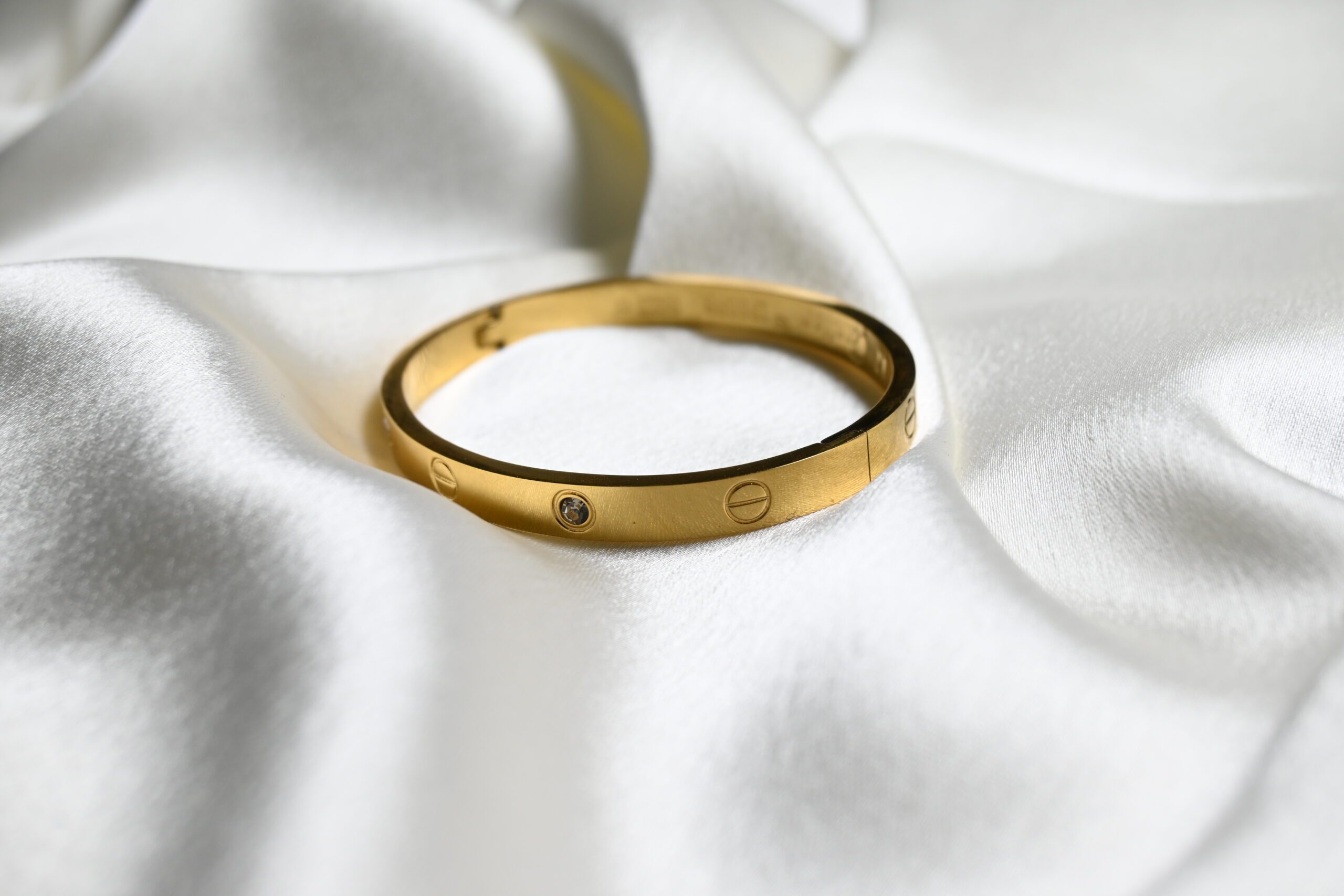 Cartier Luxe Gold Bracelet: Opulent Elegance - Zahra Zarq